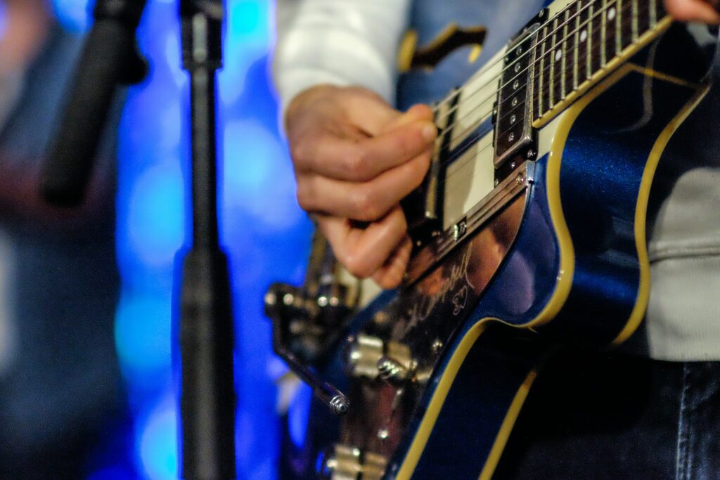 person playing guitar